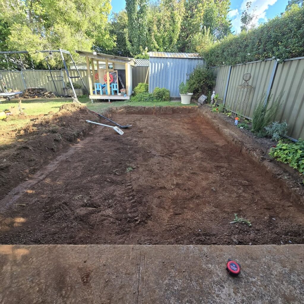 Backyard excavated and levelled ready for a slab